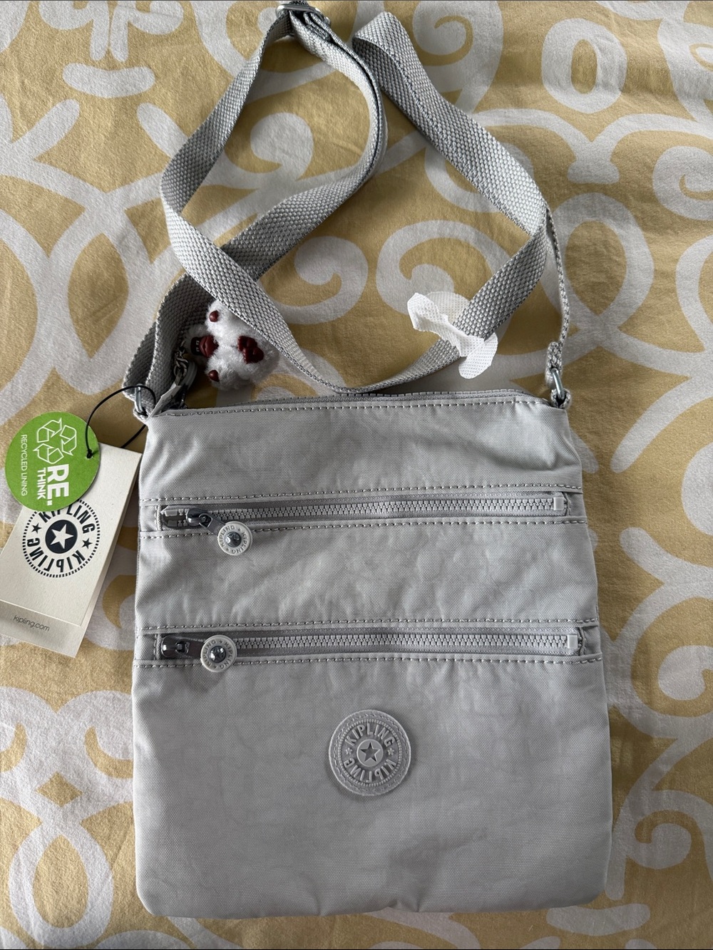Kipling Light Gray Crossbody Bag with Key Charm